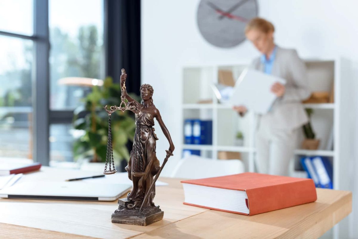 bronze-themis-sculpture-on-female-lawyer-table-2022-12-16-21-34-02-utc-min.jpg